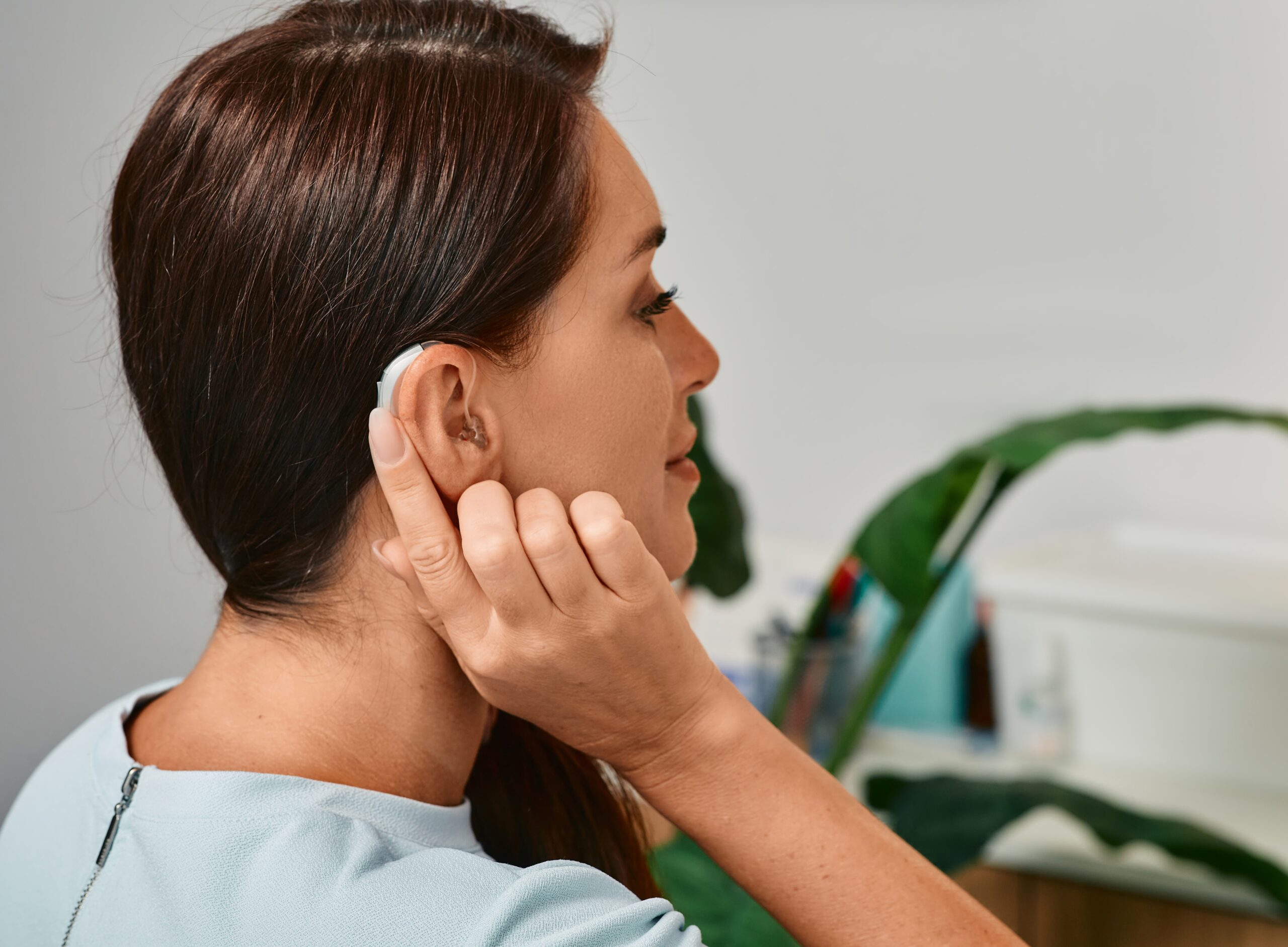 Adult,Woman,With,Hearing,Aid,Behind,The,Ear,Can,Hear